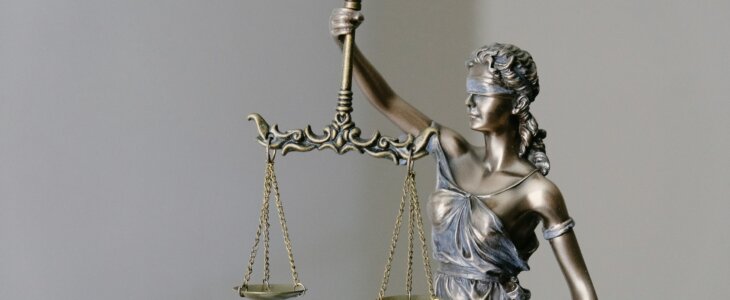 statue of justice holding scales